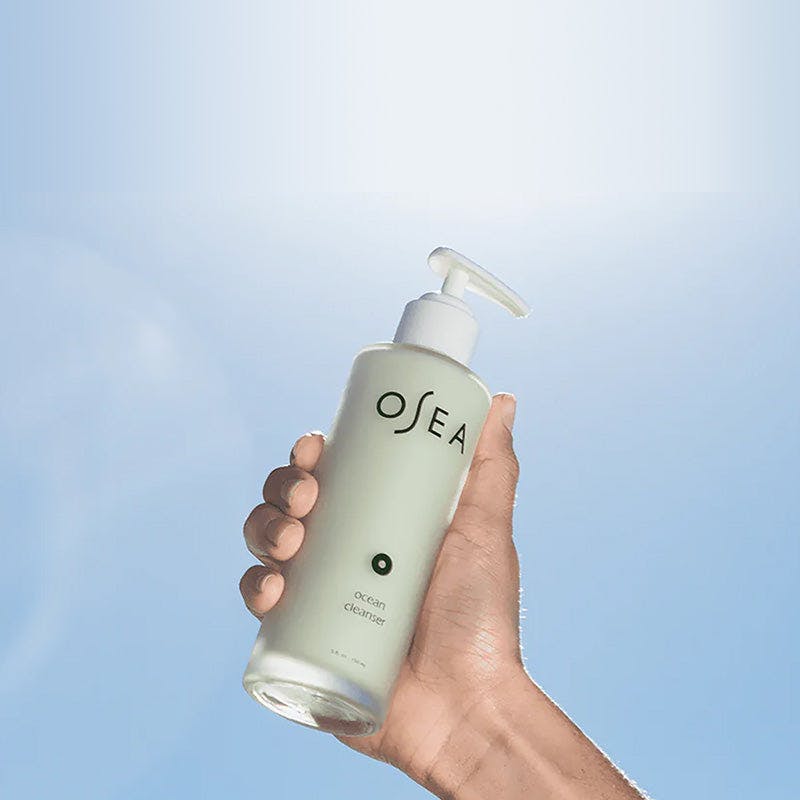 Hand holding bottle of Ocean Cleanser